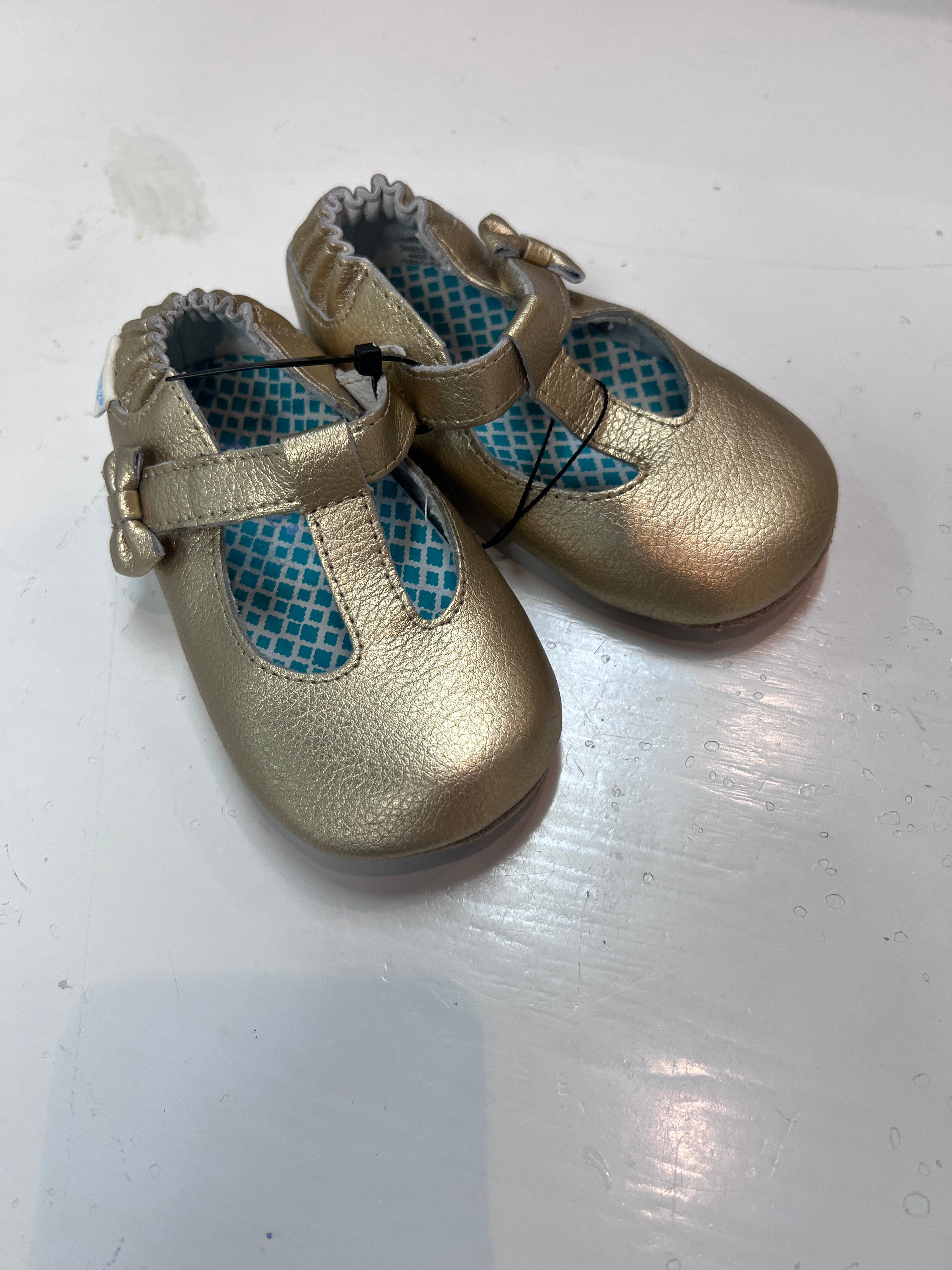 gold Robeez shoes, C6